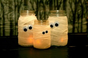 halloween26 - Mason jars become mummies in this simple Halloween DIY project. Photo credit: Liberty Cameron, craftsredesigned.blogspot.com